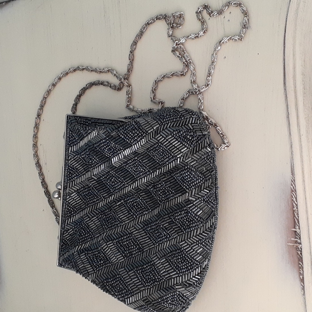 ^ Vintage La Regale hand beaded clutch purse